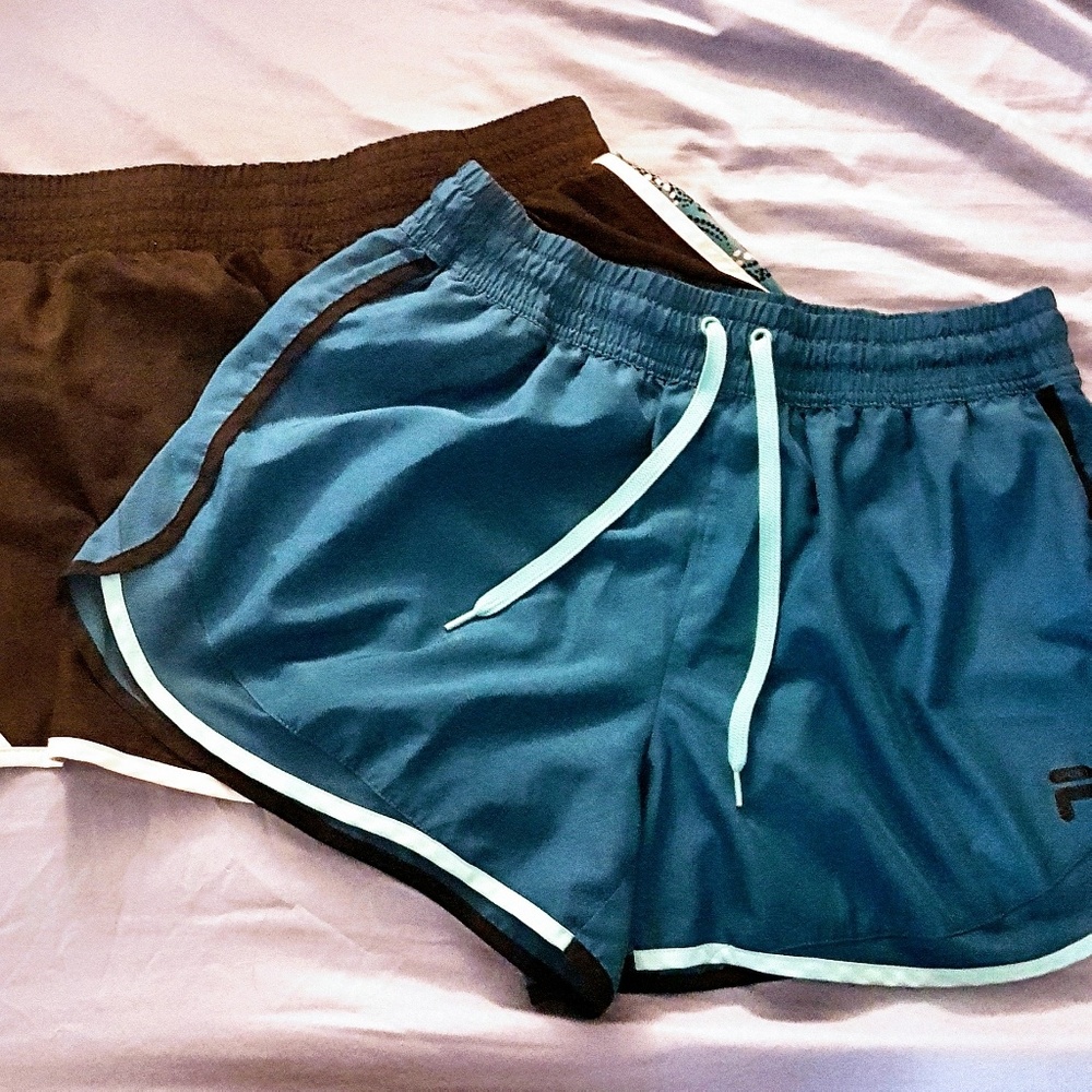 Bundle 2 workout shorts Fila and Tek Gear size med